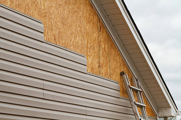 Professional Emergency Siding Repair technician working in Delaware, OH